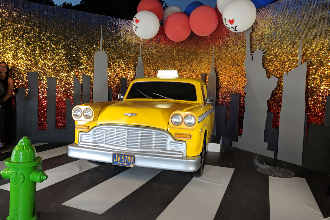 This sparkling sequin wall was produced as a backdrop to the iconic yellow NY taxi and props for the party of 4th July