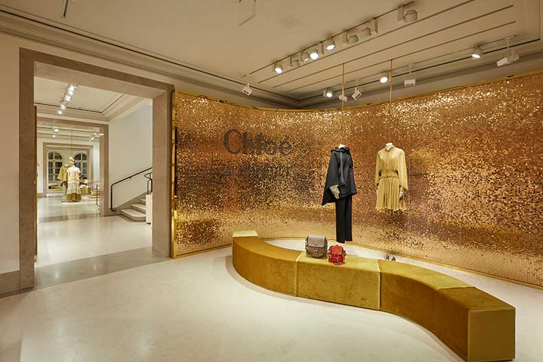 Curved shimmer sequin wall panel for fashion visual merchandising display