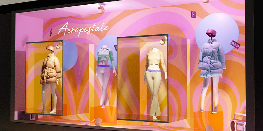 A colourful shop window display for a fashion brand.