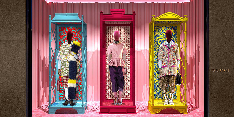 A bright and colourful store window design by Gucci in 2023