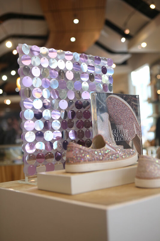 In store sequin wall display for fashion retail merchandising