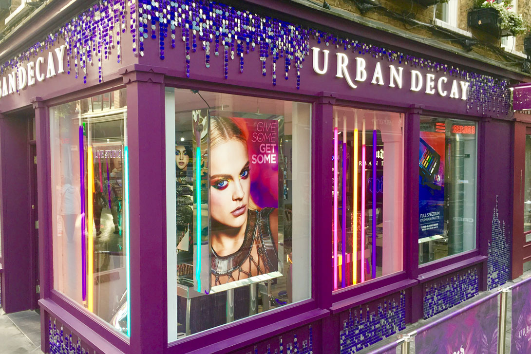 Eye catching store decor with silver and royal purple 30mm sequins in Carnaby Street