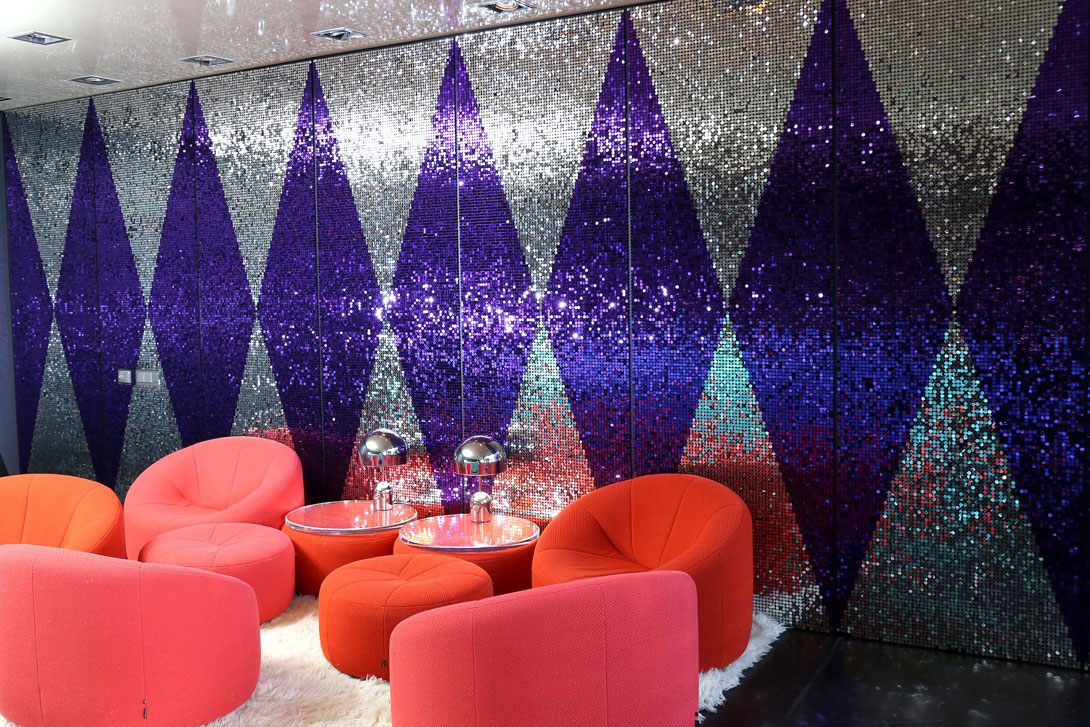 Sequin wall using purple and silver sequins for corporate VIP area in Germany